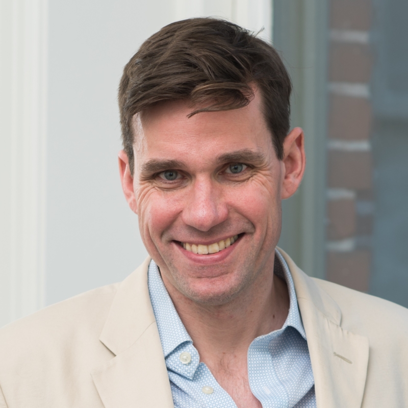 Peter Betjemann in front of a building