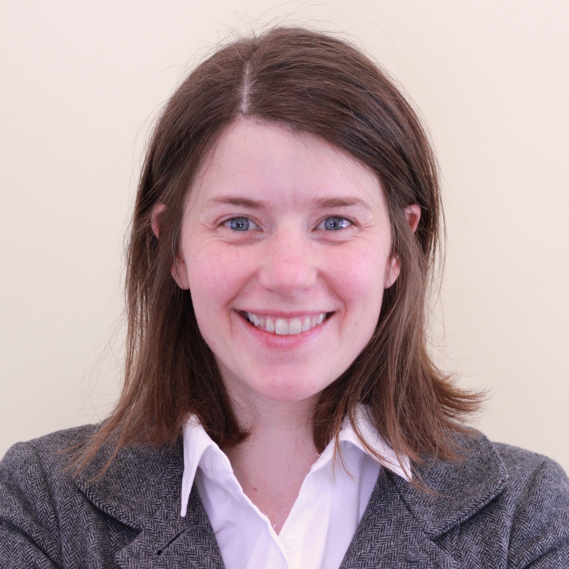 Kristin O'Connell in front of an off-white background