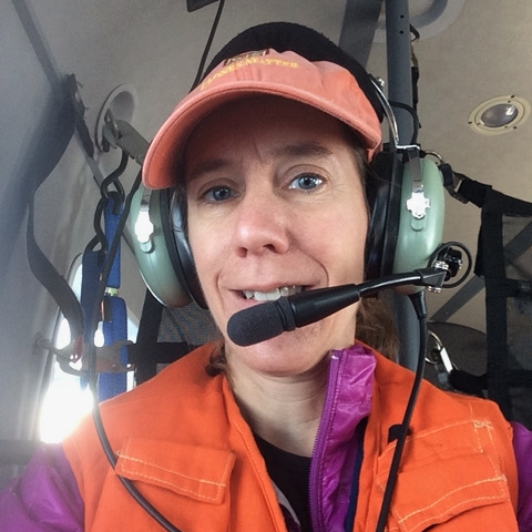 Sarah Fowell in a plane wearing a headset