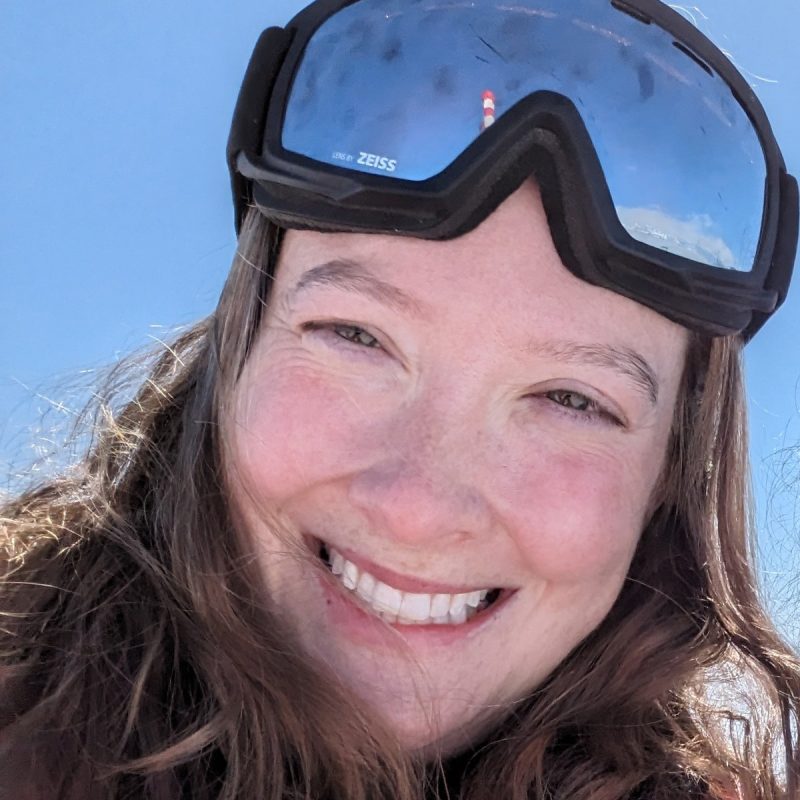 Julia with snow goggles on her head