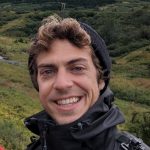 Matt in front of green hills