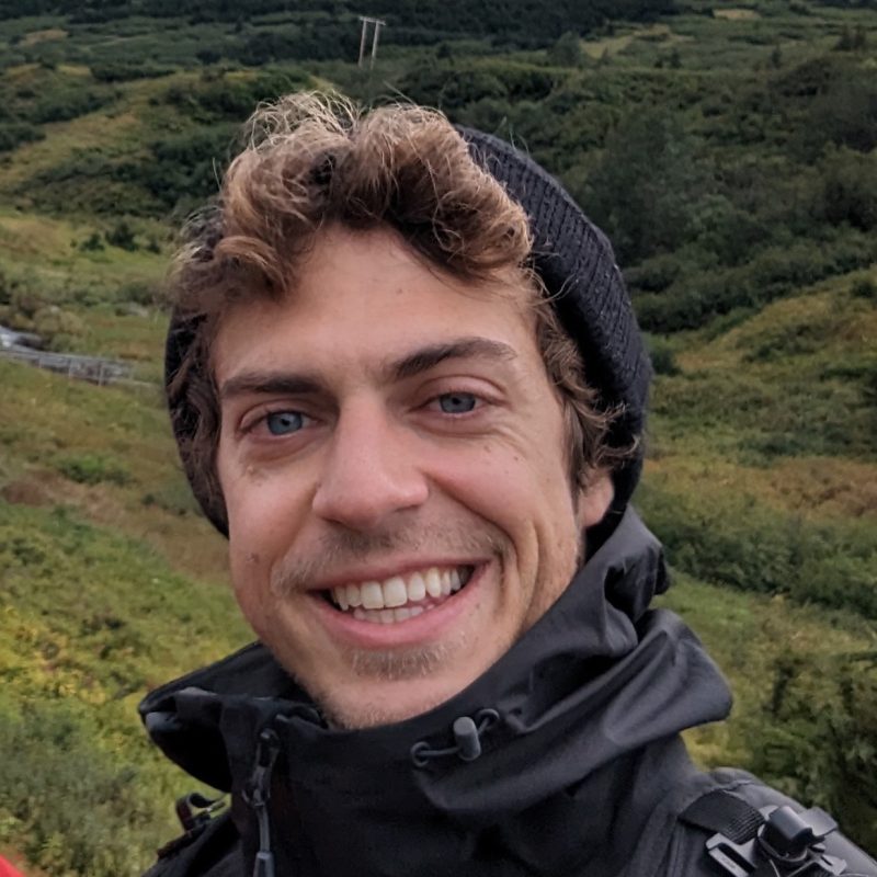 Matt in front of green hills