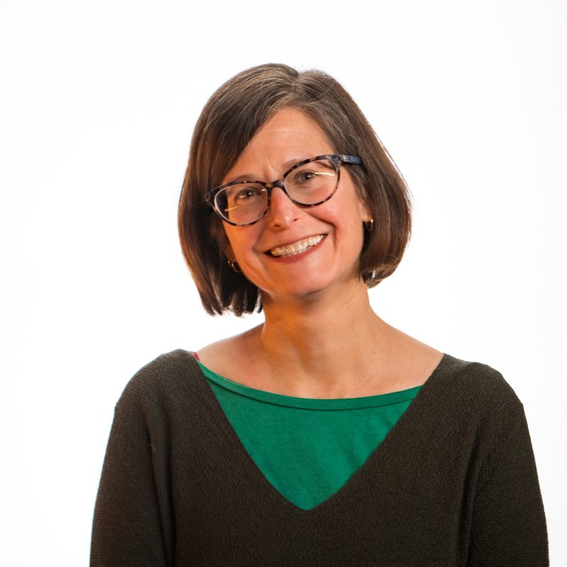 Becky in front of a white background