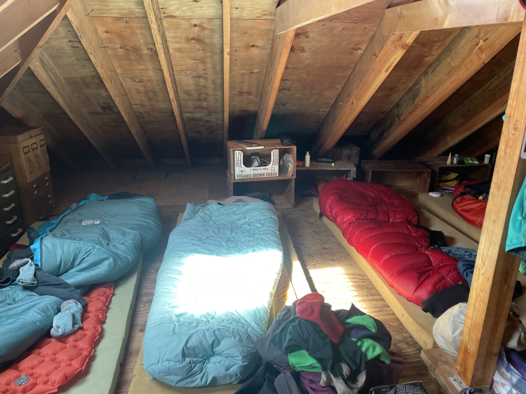 sleeping bags with sunlight shining on them from a window