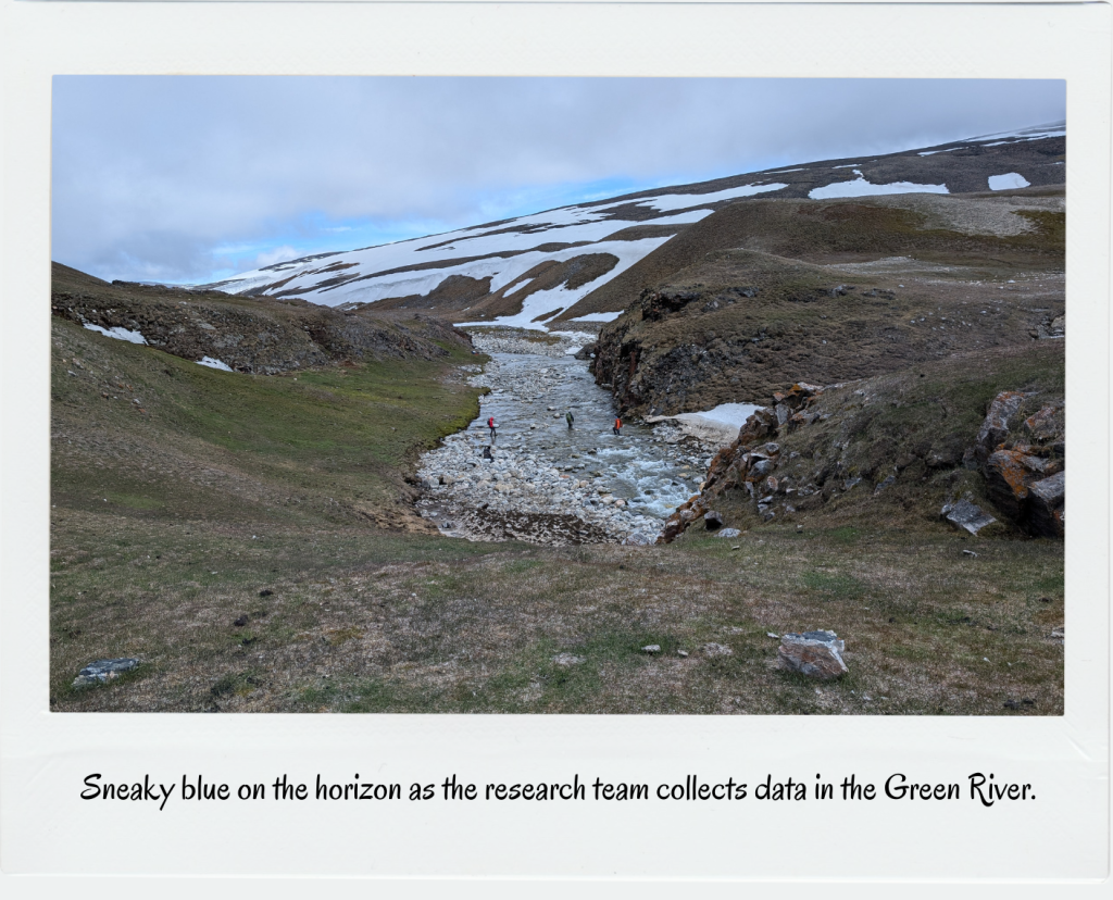 Sneaky blue on the horizon as the research team collects data in the Green River