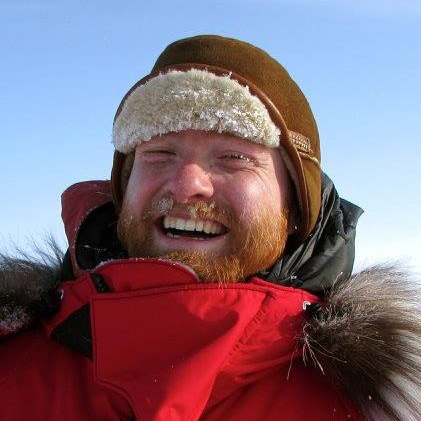 Tom in front of a blue sky