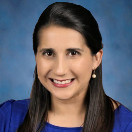 Amanda in front of a blue background