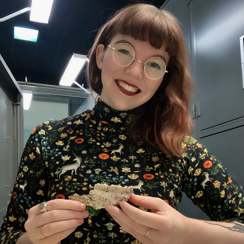 Britney holding a piece of bone