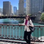 Chloe in front of a city skyline