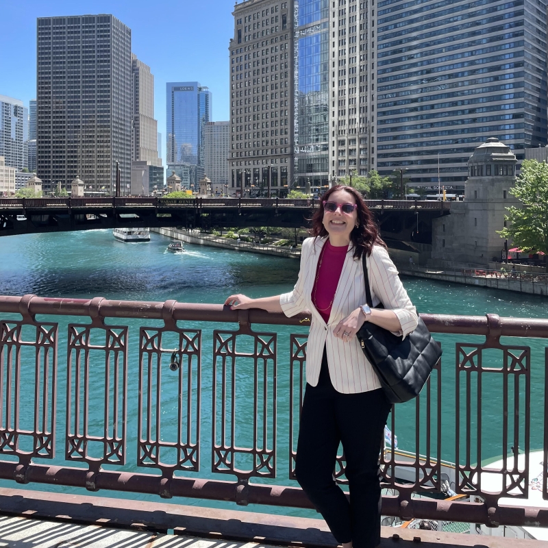 Chloe in front of a city skyline