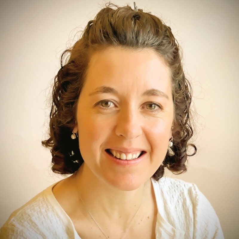 Elsa in front of an off-white background