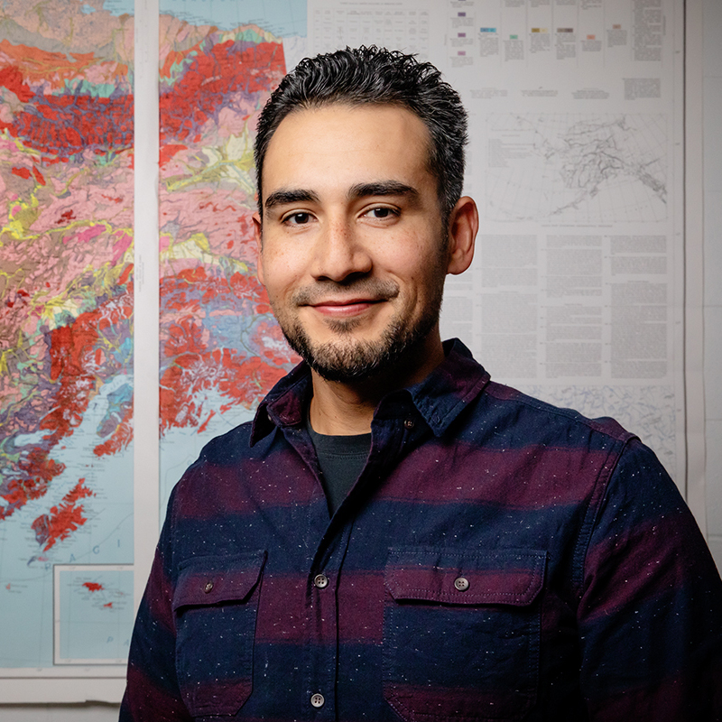 Mark in front of a map