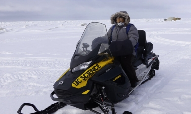 Bethany on a snowmobile