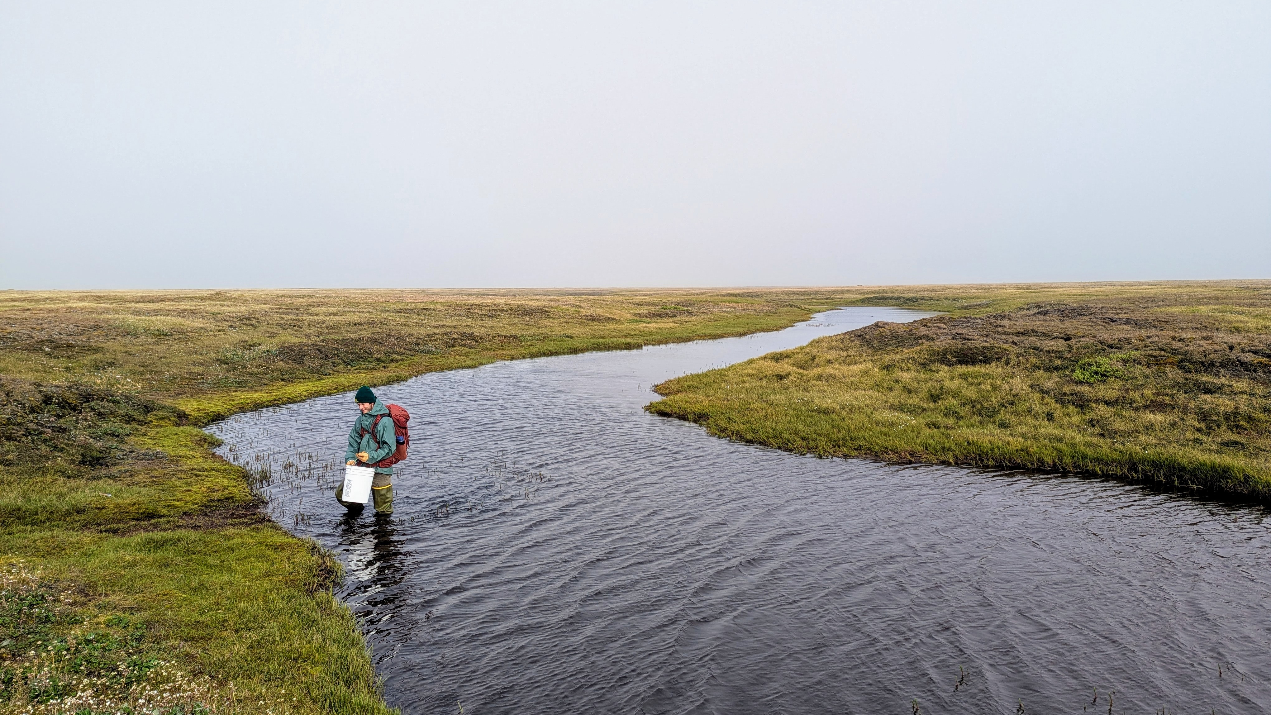 A person standing in the river