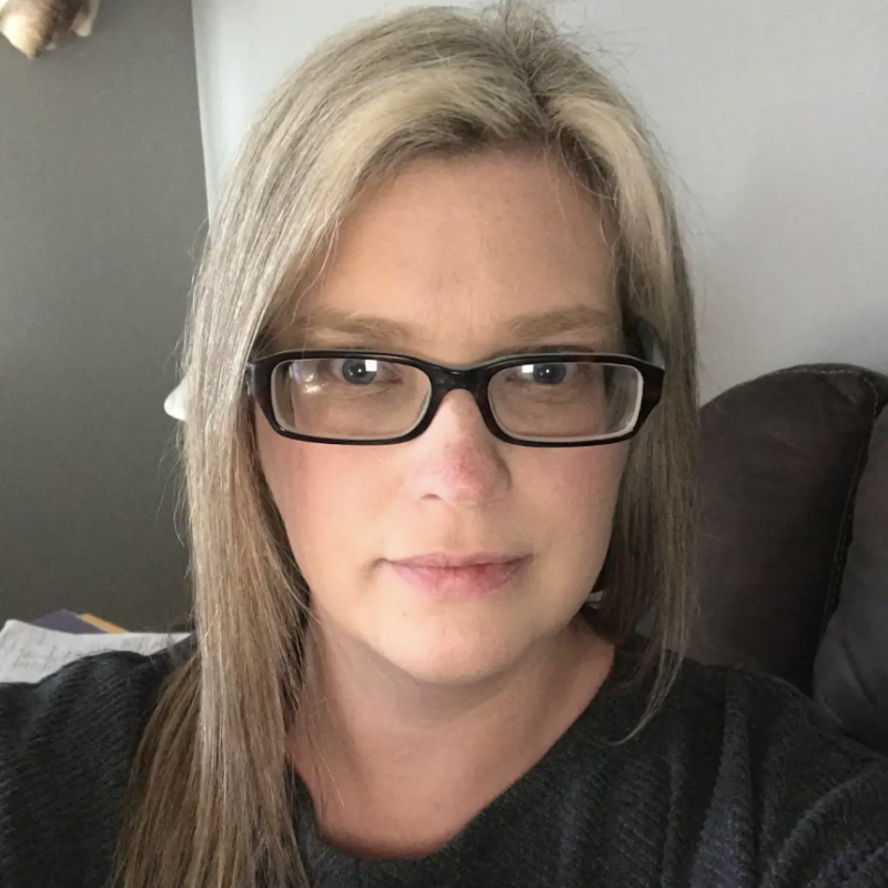 Close up of Annie wearing glasses