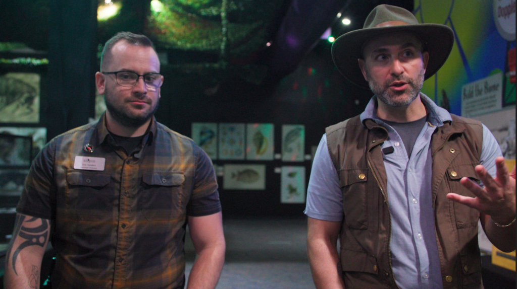 Eric standing next to Coyote Peterson 