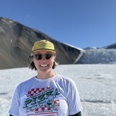 Jade in front of a snowy landscape