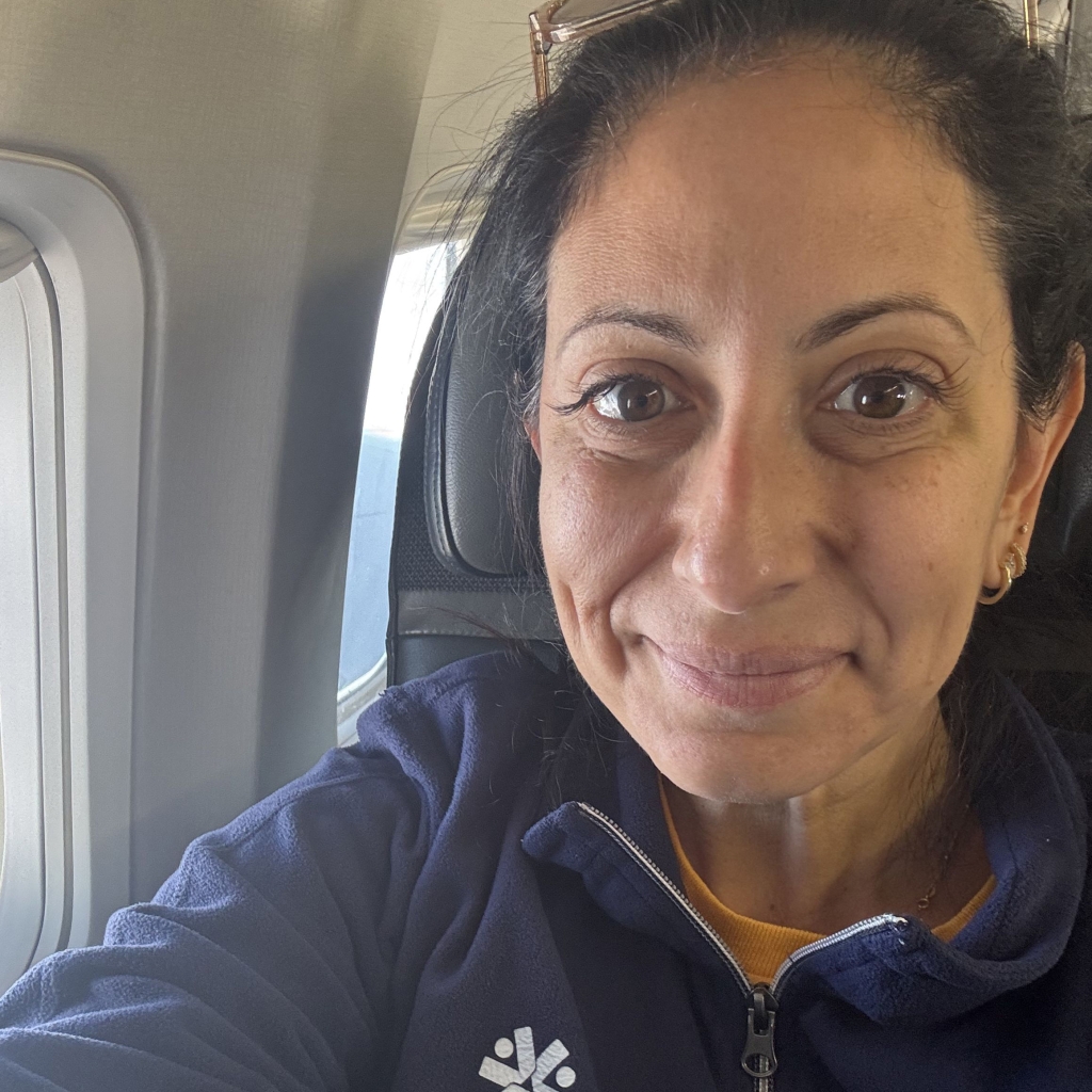 A selfie of Lauren on a plane